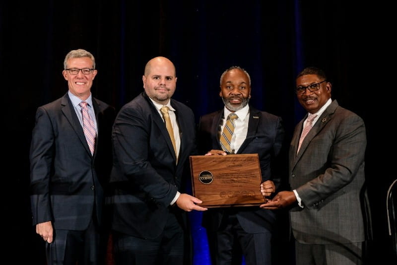 People holding Award